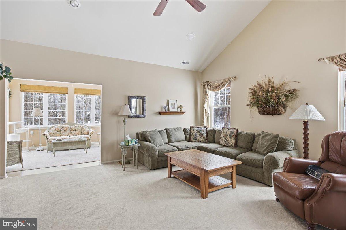 44 Mitchell Court Marlton, NJ 08053 - Photo 14 of 46 a living room with furniture and a large window
