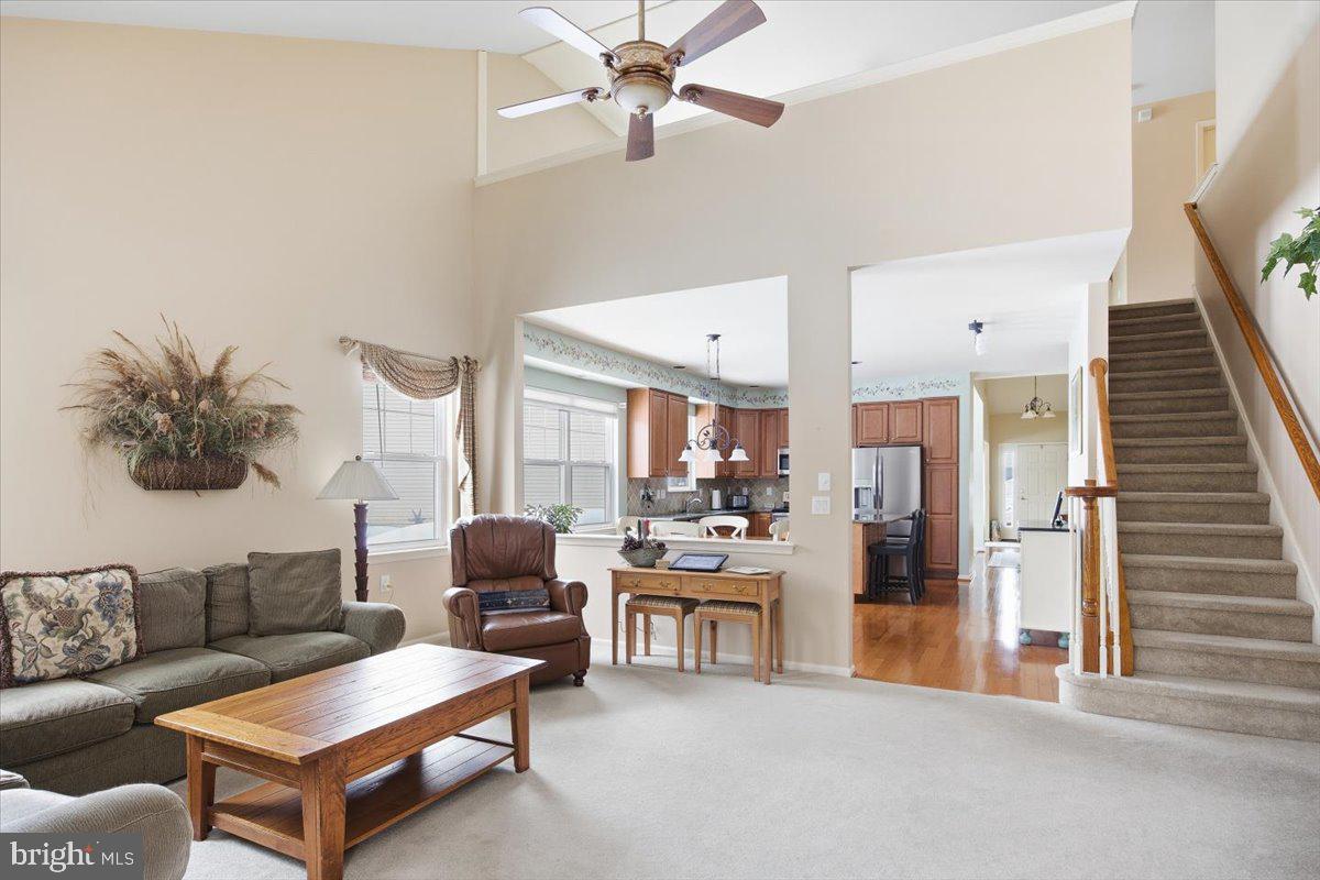 44 Mitchell Court Marlton, NJ 08053 - Photo 15 of 46 a living room with furniture and a view of kitchen