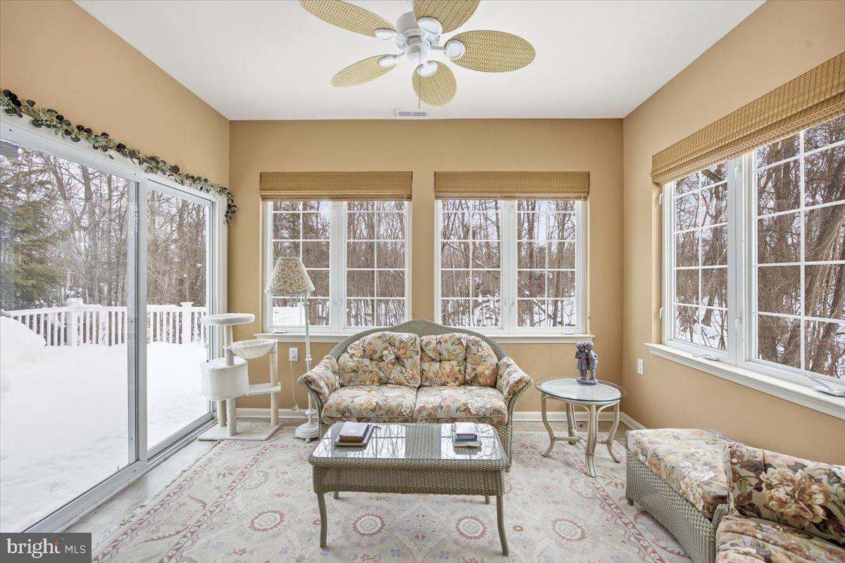 44 Mitchell Court Marlton, NJ 08053 - Photo 17 of 46 a living room with furniture and a large window