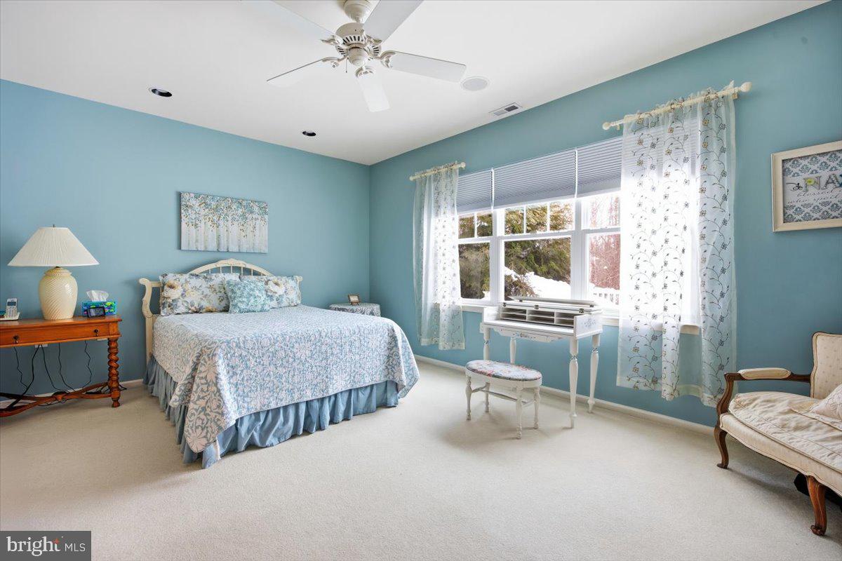 44 Mitchell Court Marlton, NJ 08053 - Photo 18 of 46 a bedroom with bed and a chandelier