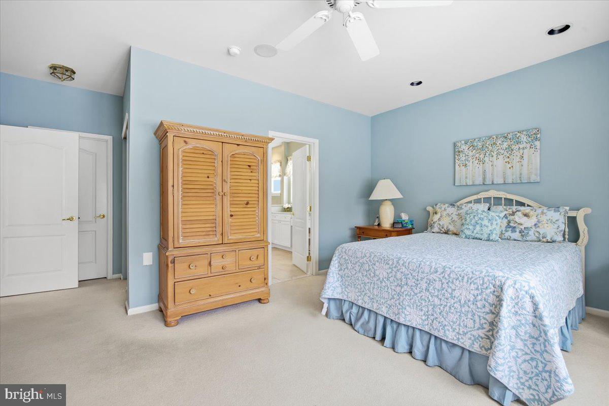 44 Mitchell Court Marlton, NJ 08053 - Photo 20 of 46 a bedroom with a bed and a chandelier