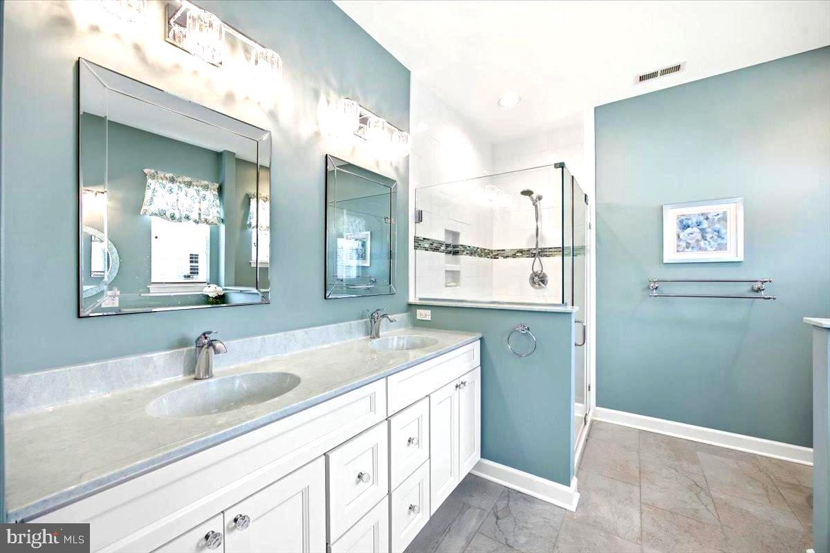 44 Mitchell Court Marlton, NJ 08053 - Photo 22 of 46 a bathroom with a sink and a mirror