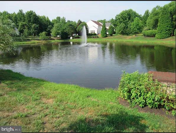 44 Mitchell Court Marlton, NJ 08053 - Photo 43 of 46 a view of a lake with a house in the background