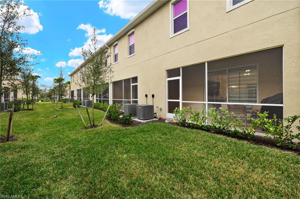 2934 Citrus Street Naples, FL 34120 - Photo 21 of 29 a view of an house with backyard space and garden view