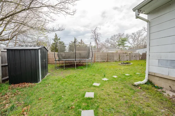 a view of a backyard with a garden