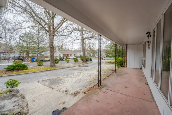 a view of a backyard of the house