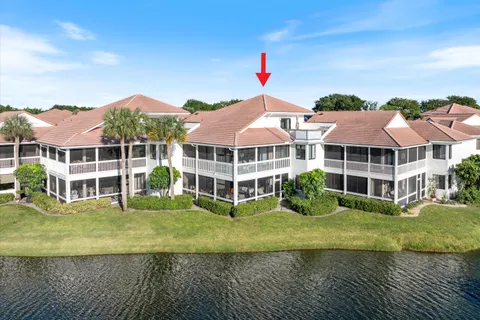 a view of houses with yard