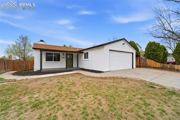 a house with yard in front of it