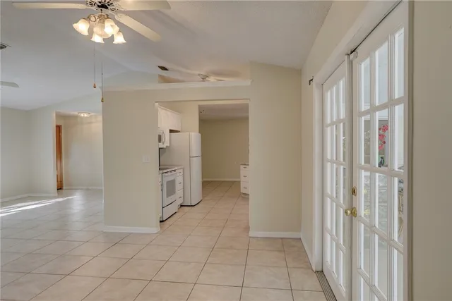 a view of a hallway with a bathroom