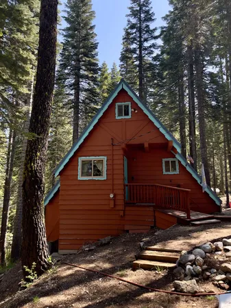 a house view with a backyard space