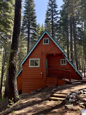 a house view with a backyard space