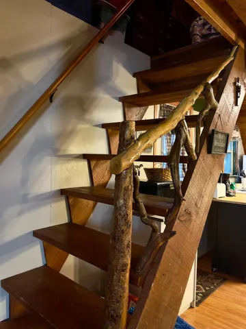 a view of entryway with wooden floor