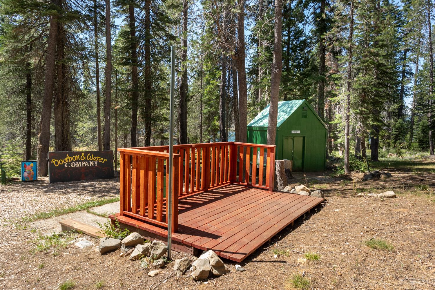 1743 Fiddleneck Road Strawberry Valley, CA 95981 - Photo 17 of 20 a view of a wooden deck with trees in the background