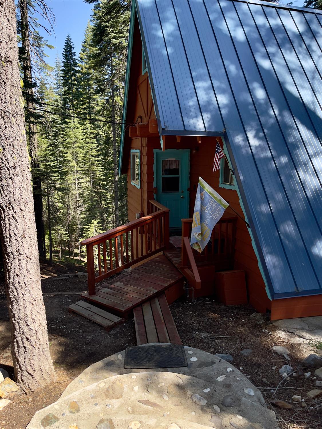 1743 Fiddleneck Road Strawberry Valley, CA 95981 - Photo 2 of 20 a view of balcony with wooden floor and outdoor seating