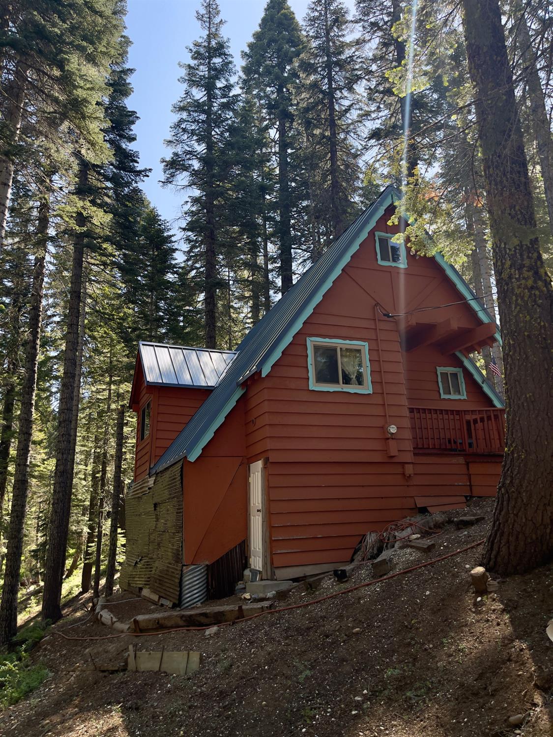 1743 Fiddleneck Road Strawberry Valley, CA 95981 - Photo 4 of 20 a view of a small house with yard and covered with trees