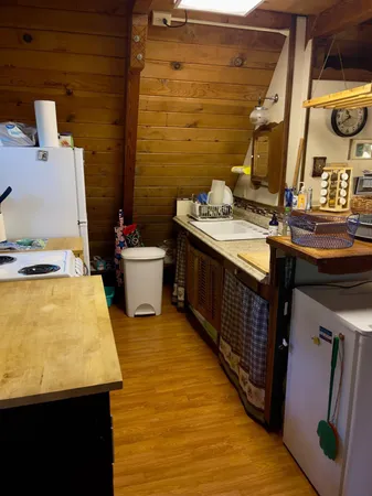 a bathroom with sink and mirror