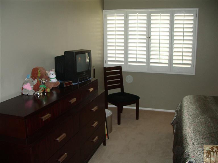 1717 East Sonora Road Palm Springs, CA 92264 - Photo 11 of 25 a room with furniture and window