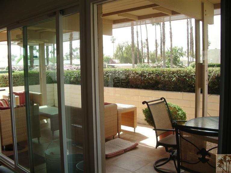 1717 East Sonora Road Palm Springs, CA 92264 - Photo 18 of 25 a view of a room with a large window and chair