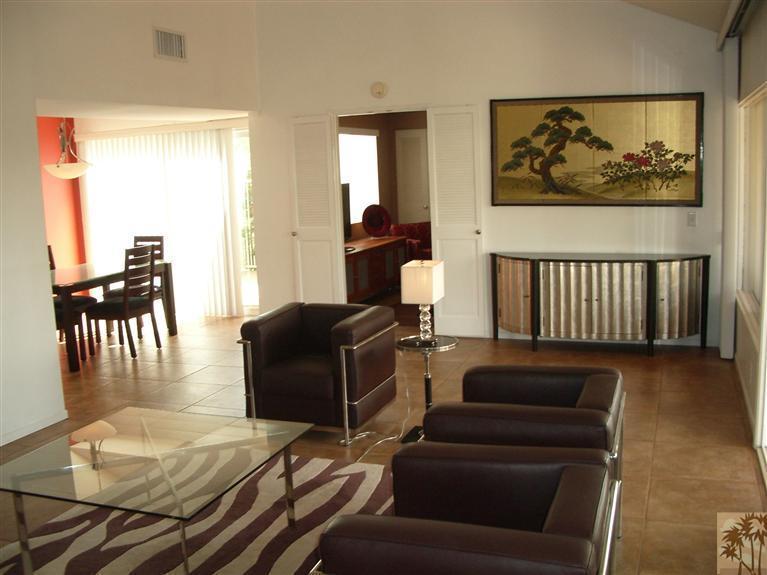 1717 East Sonora Road Palm Springs, CA 92264 - Photo 3 of 25 a living room with furniture and wooden floor