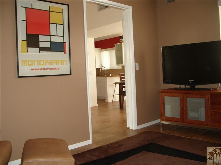 1717 East Sonora Road Palm Springs, CA 92264 - Photo 6 of 25 a living room with furniture and a flat screen tv