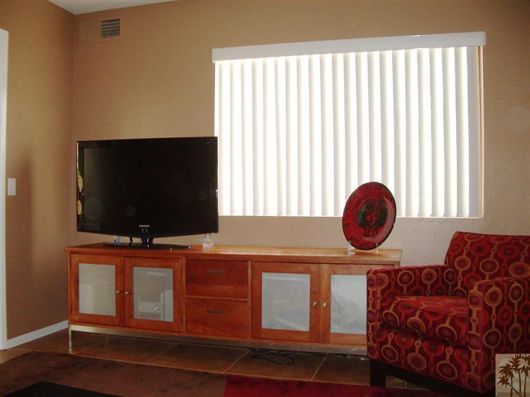 1717 East Sonora Road Palm Springs, CA 92264 - Photo 7 of 25 a living room with furniture and a flat screen tv
