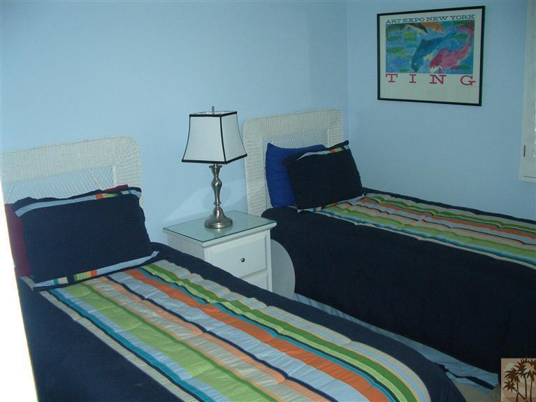 1717 East Sonora Road Palm Springs, CA 92264 - Photo 8 of 25 a view of a room with gym equipment