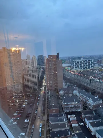 a view of a city with tall buildings