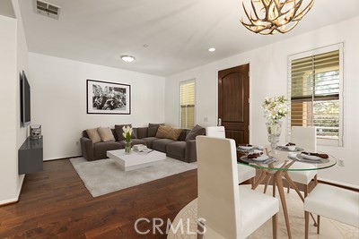 20332 Paseo Meriana Porter Ranch, CA 91326 - Photo 8 of 19 a living room with furniture and a large window