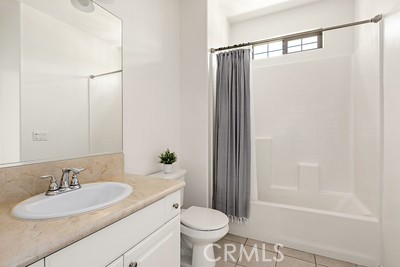 20332 Paseo Meriana Porter Ranch, CA 91326 - Photo 10 of 19 a bathroom with a sink toilet and shower