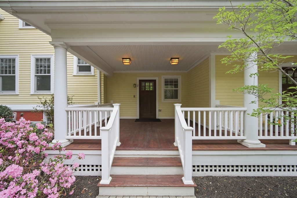 a view of porch with a bench