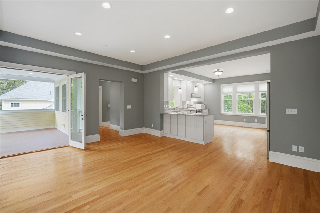 151 Amity Street, Unit 2 Amherst, MA 01002 - Photo 16 of 42 a view of a kitchen with wooden floor and a kitchen