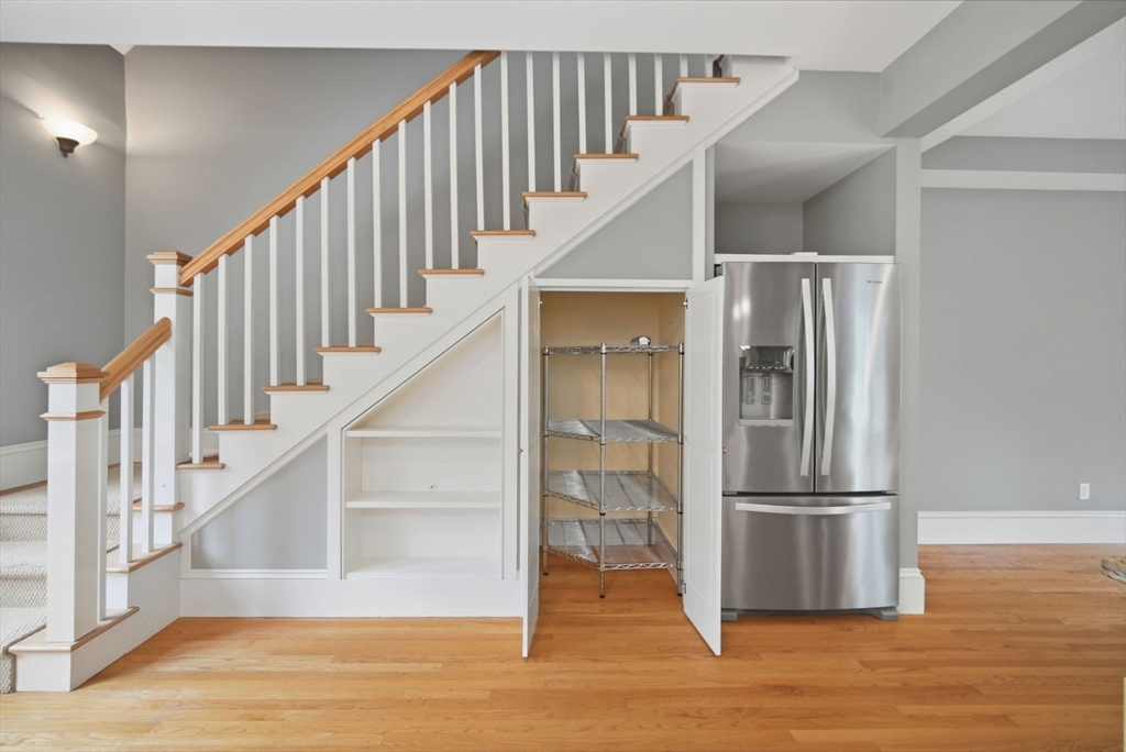 151 Amity Street, Unit 2 Amherst, MA 01002 - Photo 21 of 42 a view of entryway and hall with wooden floor