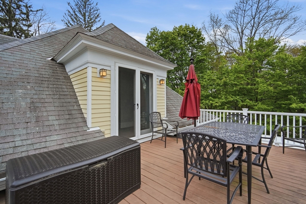 151 Amity Street, Unit 2 Amherst, MA 01002 - Photo 33 of 42 a view of a chairs and table in the balcony