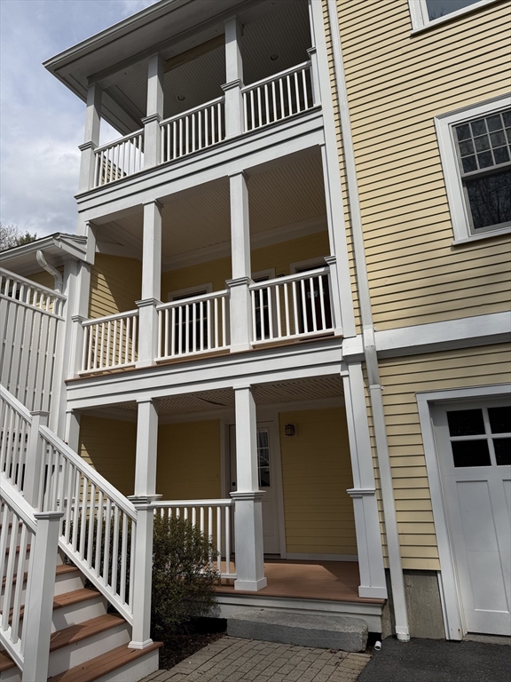 151 Amity Street, Unit 2 Amherst, MA 01002 - Photo 37 of 42 a view of a house with a deck