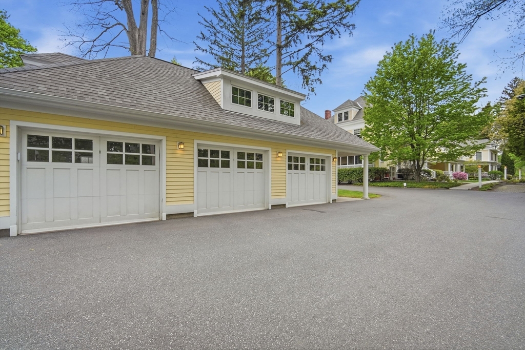 151 Amity Street, Unit 2 Amherst, MA 01002 - Photo 5 of 42 front view of a house with a street