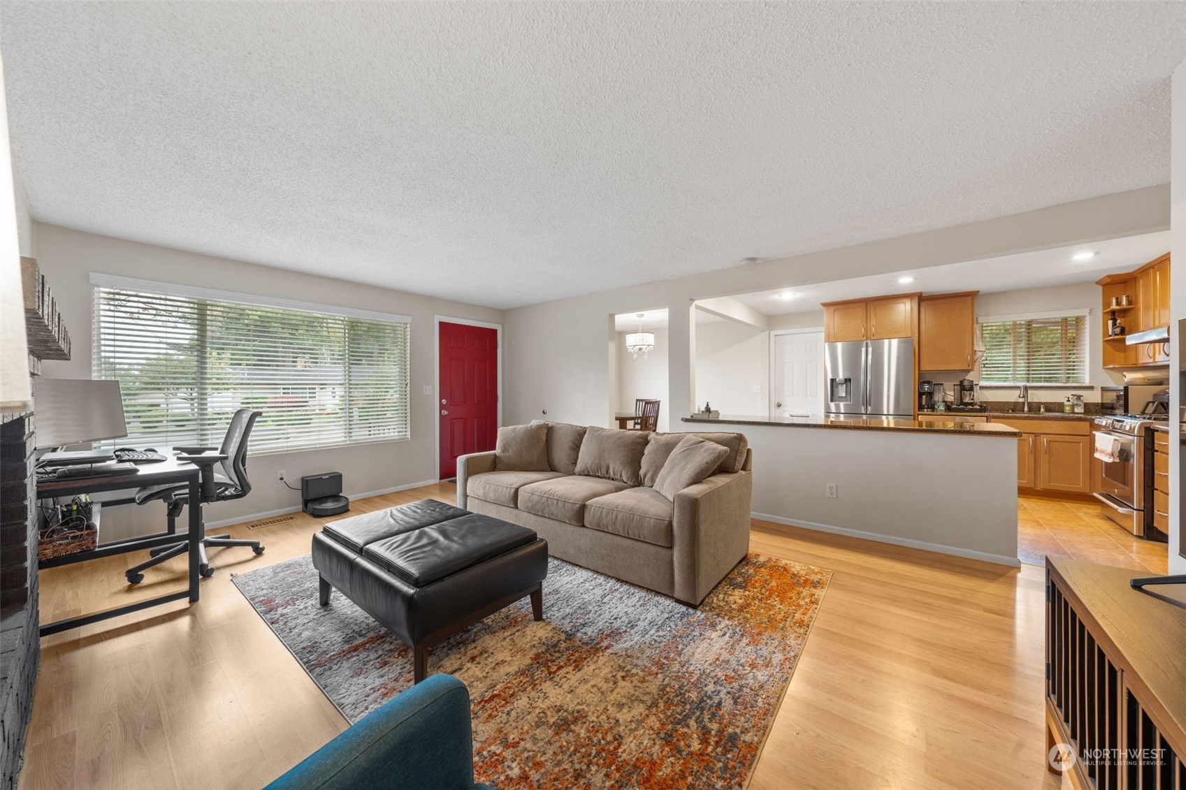 2746 Northeast 24th Street Renton, WA 98056 - Photo 5 of 20 a living room with furniture and a large window