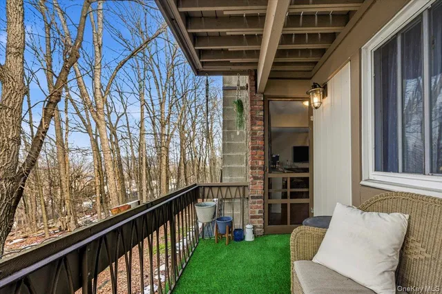 a porch with seating space