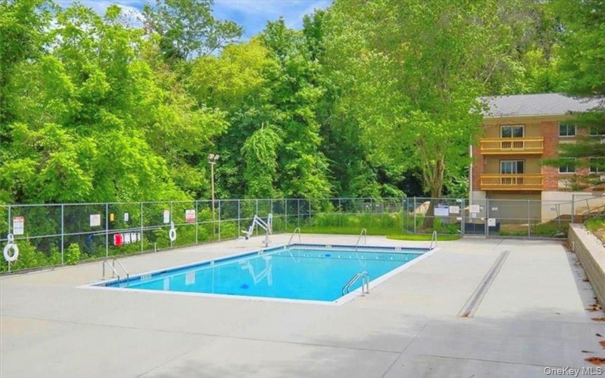 9 North James Street, Unit B Peekskill, NY 10566 - Photo 18 of 22 Community pool featuring a patio area
