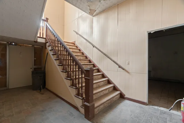 a view of a hallway with windows