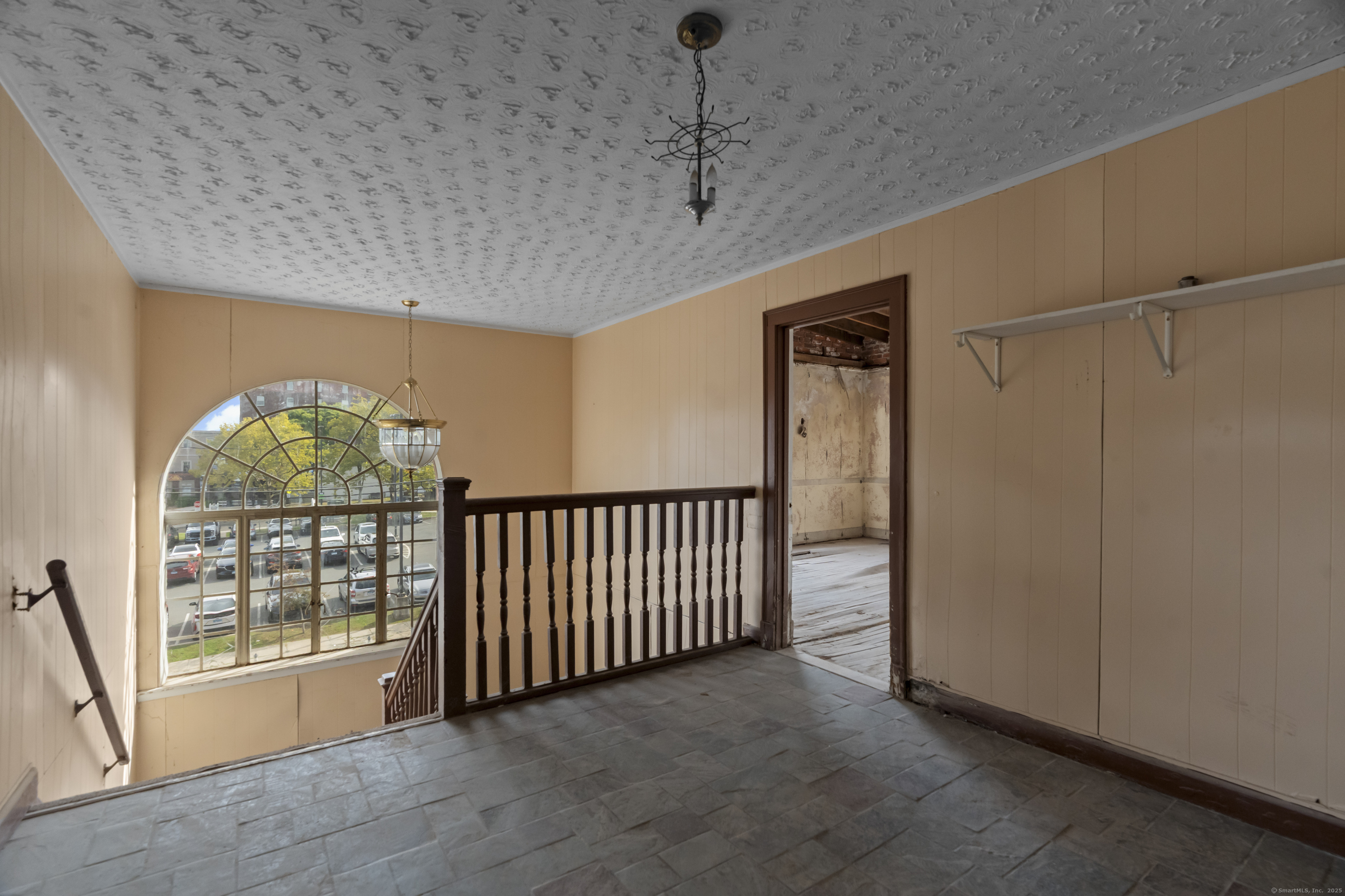 54 Washington Street Middletown, CT 06457 - Photo 14 of 19 a view of a hallway with windows