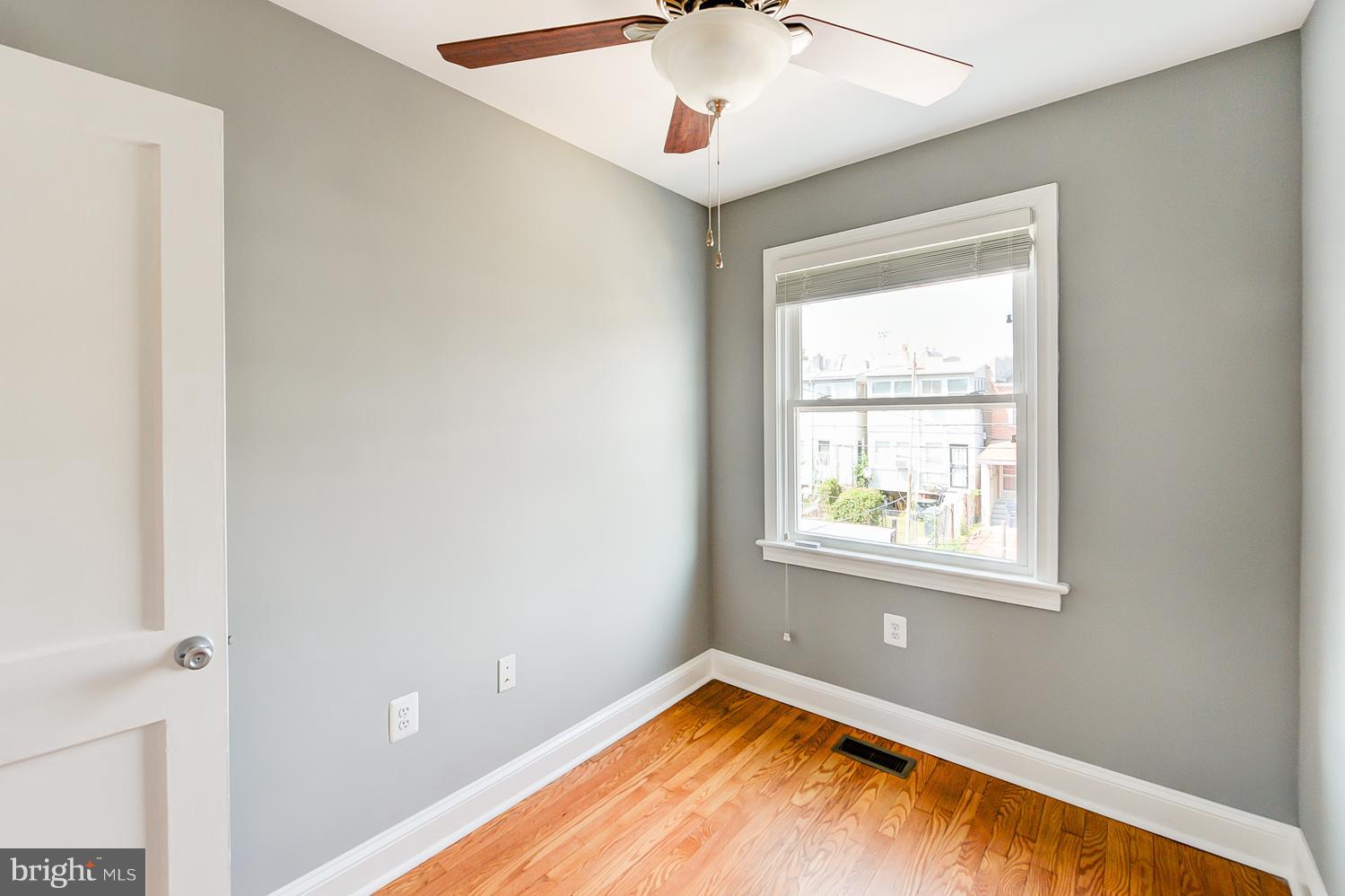 1334 Queen Street Northeast Washington, DC 20002 - Photo 19 of 29 a view of an empty room and window