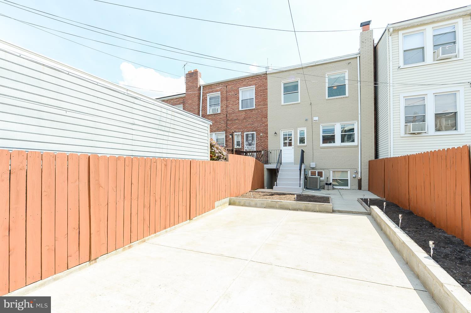 1334 Queen Street Northeast Washington, DC 20002 - Photo 23 of 29 a backyard of a house
