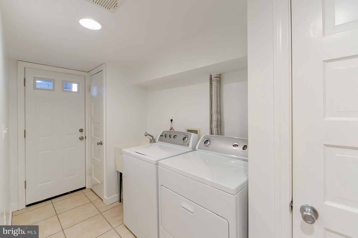 1334 Queen Street Northeast Washington, DC 20002 - Photo 29 of 29 a utility room with dryer and washer