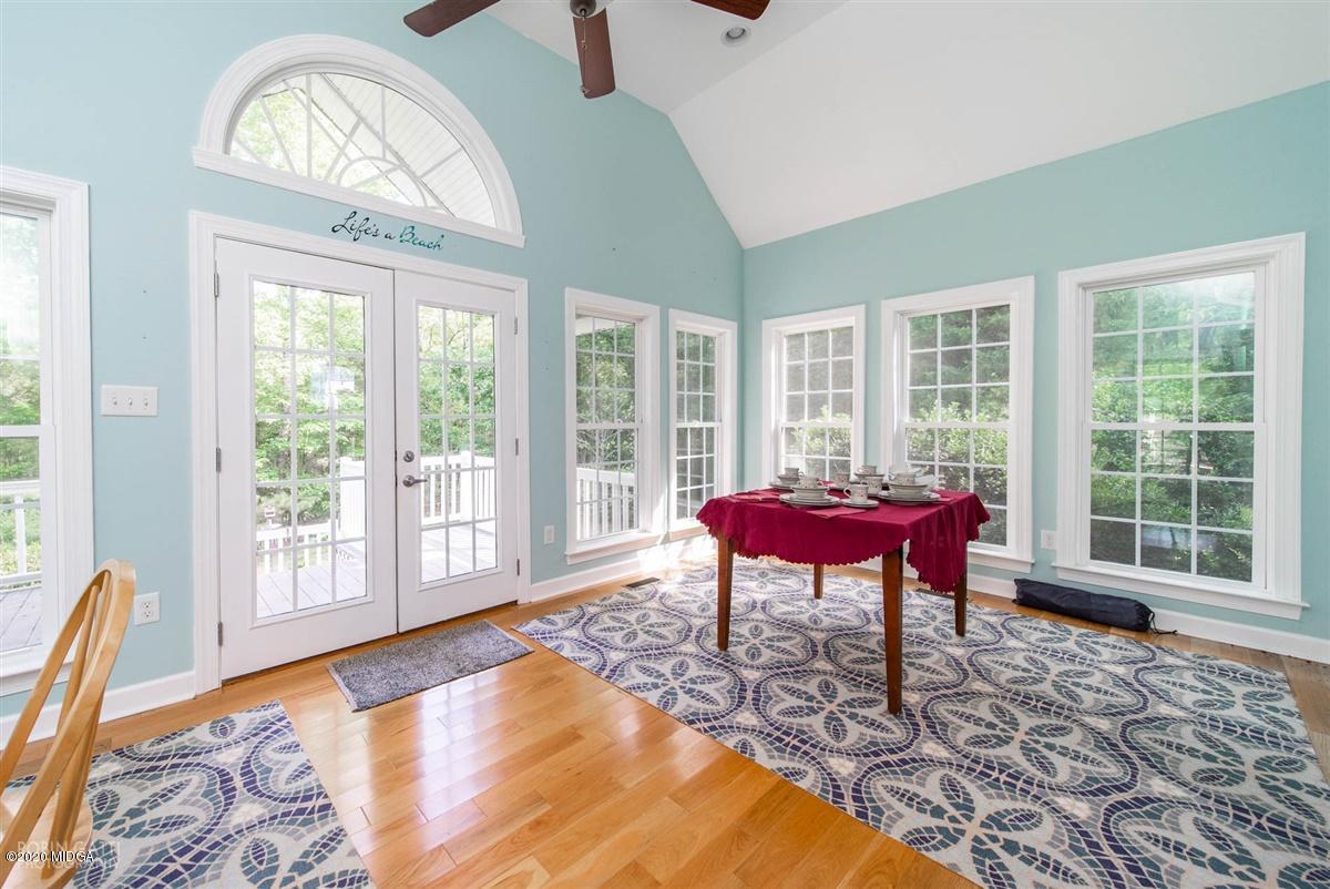 4271 Upper River Road Gray, GA 31032 - Photo 24 of 40 a living room with furniture and a large window