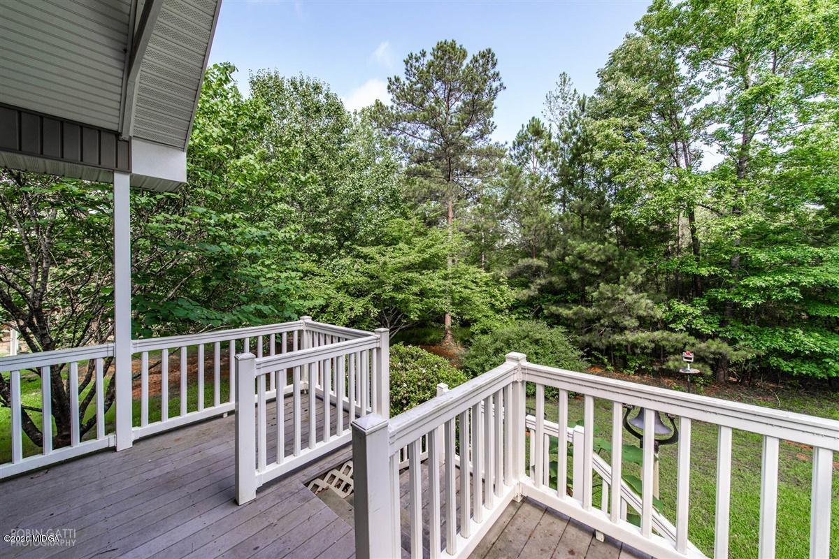 4271 Upper River Road Gray, GA 31032 - Photo 26 of 40 a view of roof with trees