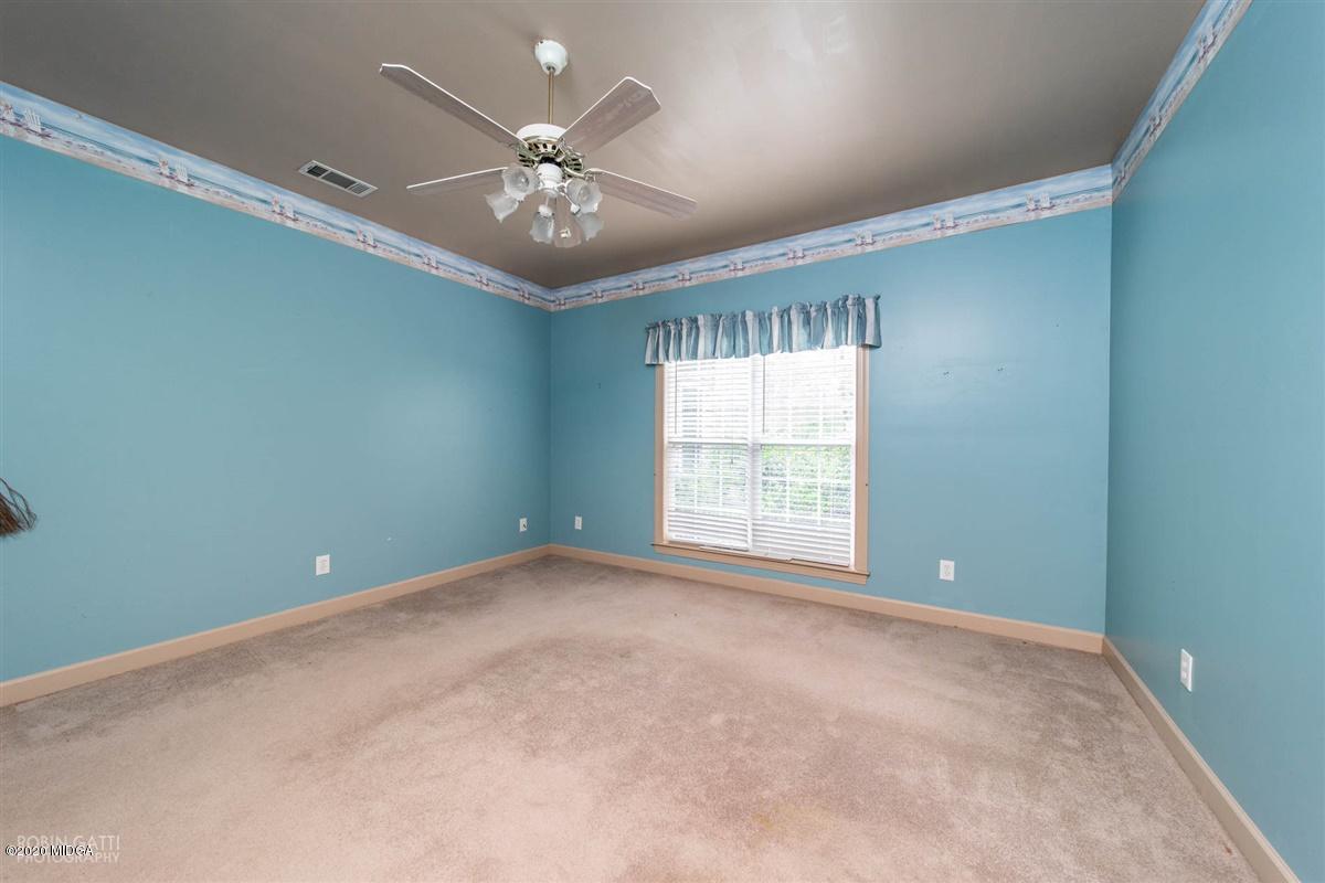 4271 Upper River Road Gray, GA 31032 - Photo 7 of 40 a view of an empty room with a window