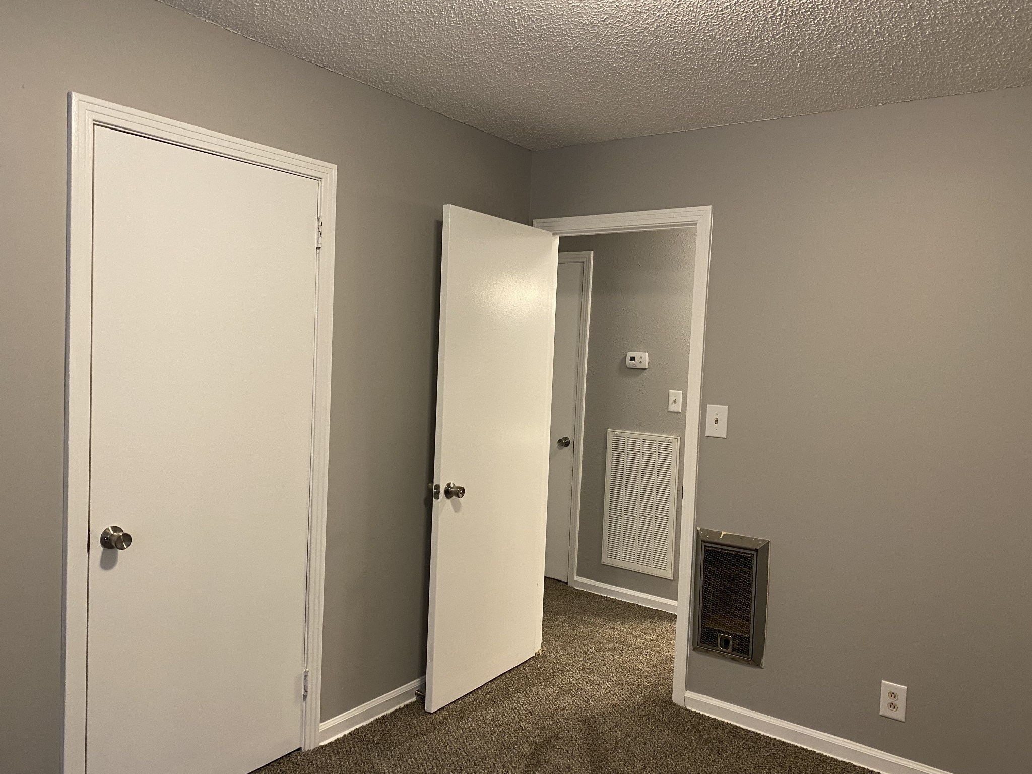 222 North 11th Street Clarksville, TN 37040 - Photo 8 of 14 a view of a bathroom with a glass door and a shower