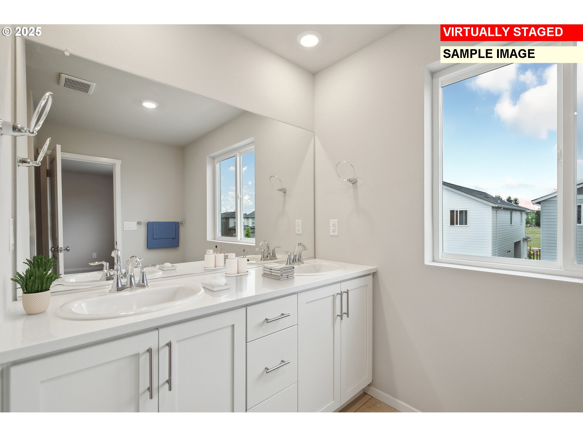 714 Merriott Lane Woodburn, OR 97071 - Photo 16 of 26 a bathroom with a sink a mirror and a vanity