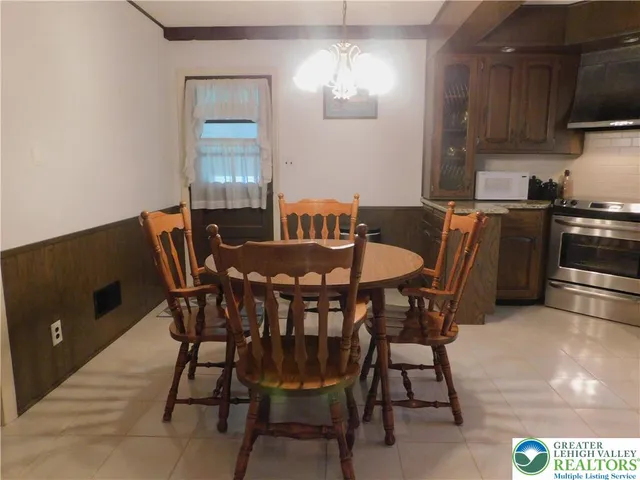 a room with furniture and a large window