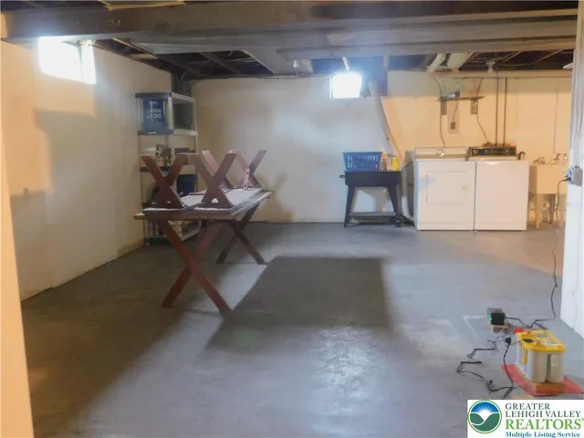 a view of a room with wooden walls